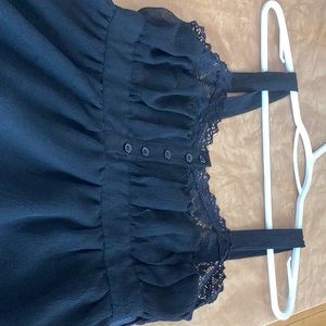 Black lined umpire dress. Cotten trim. Crepe look